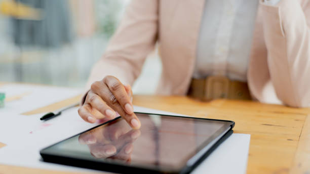 istock Worker, hands or tablet in office for online in office for schedule, business website or project research. Email, internet closeup or woman typing on touchscreen, app or technology for social media 1772071058