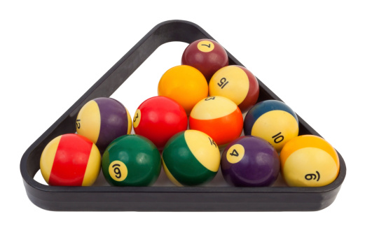 Incomplete set of pool balls in triangle. Horizontal.