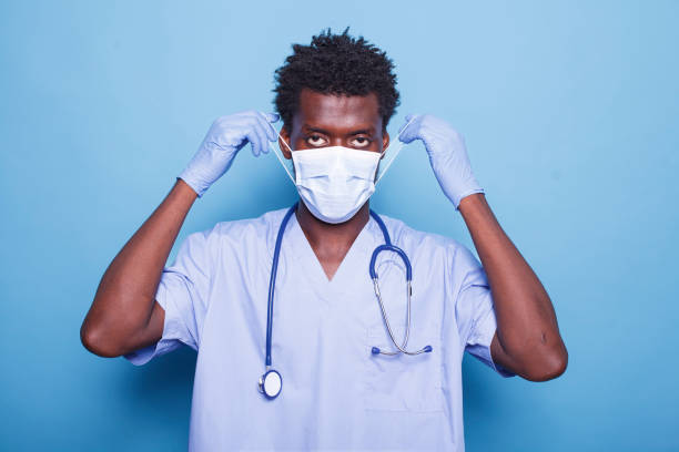istock Medical assistant putting on face mask 1772086562