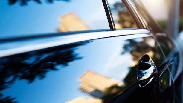 istock The sunset is reflected  on black new car 1772103690