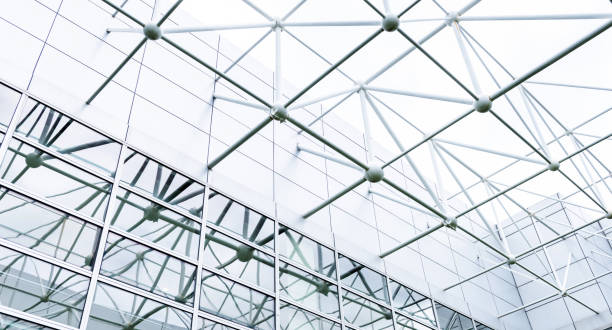 Low angle view of modern glass office building interior