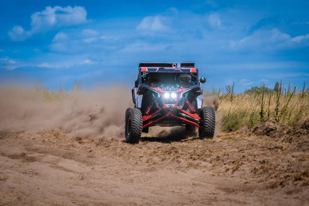 istock UTV buggy and 4x4 offroad in sandy track. Rally extreme riding 1772152951