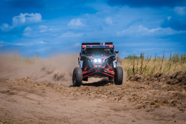 istock UTV buggy and 4x4 offroad in sandy track. Rally extreme riding 1772152963