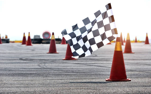 istock Checkered race flag standing on floor 1772180870