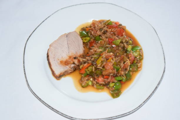 pork roast slice with rice in dark vegetable sauce - fine dining grilled spring onion healthy lifestyle imagens e fotografias de stock