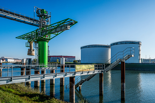 Dusk view of Germany's largest coal-fired power plant near Mannheim.\nLarge power station on the River Rhine at dusk.