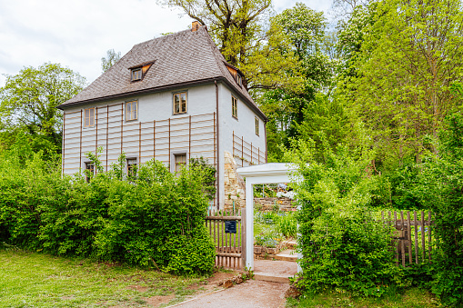 Weimar, Germany - May 12, 2023: Johann Wolfgang von Goethe's gardenhouse in spring, he lived in this building until 1782, and also helped landscape the park. Goethe was one of the key figures of German literature.