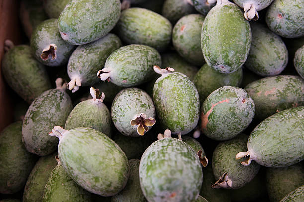 Pineapple guavas at the farmers market stock photo