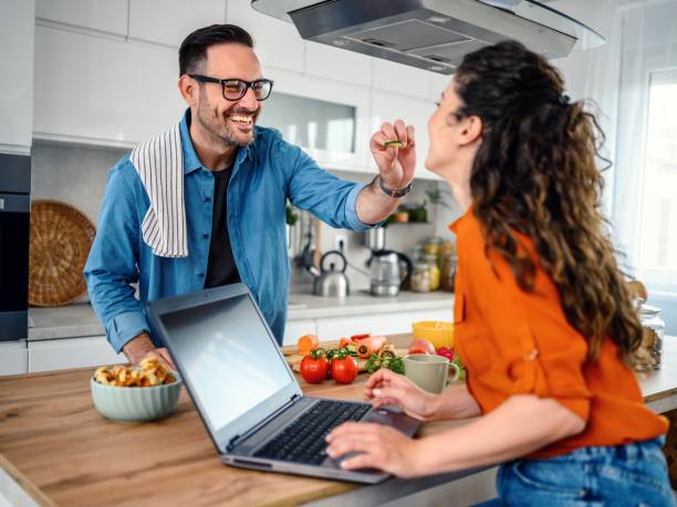 istock Husband  having fun while feeding her wife with cucumber 1772226166