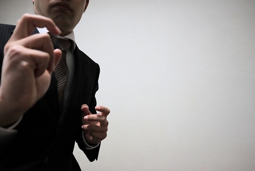 Close-up of businessman in fighting pose