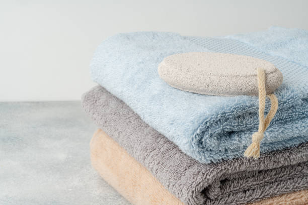 istock Pumice stone and stacked towels in a bathroom 1772235570