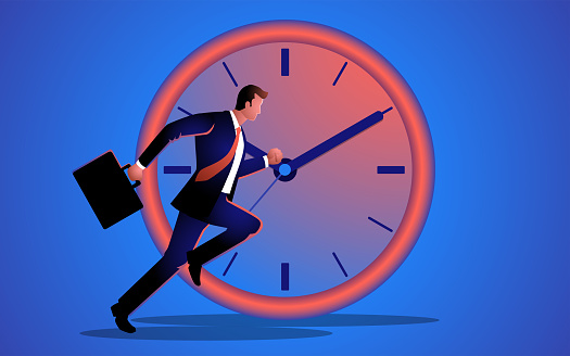 Businessman running with a giant clock as the background. Symbolizes themes of time management, efficiency, urgency, importance timely decisions in business of and the relentless pursuit of success