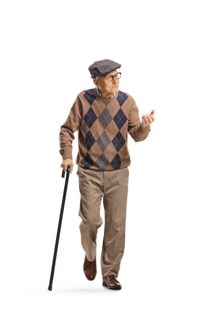 istock Elderly man with a cane walking and explaining with hand 1772239549