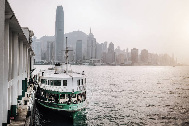 istock Hong Kong Skyline at sunset with ferry 1772248475