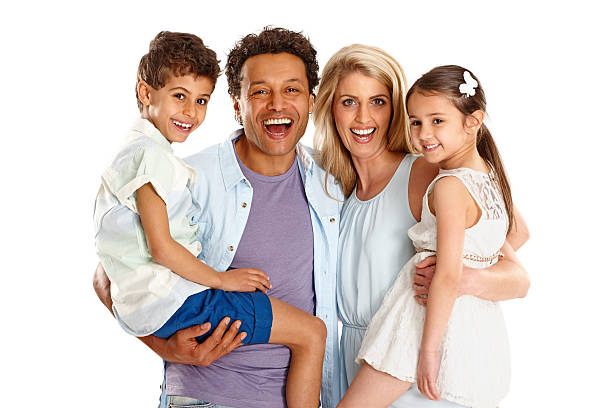 Portrait of lying couple with children on their back   Note to inspector: the image is pre-Sept 1 2009