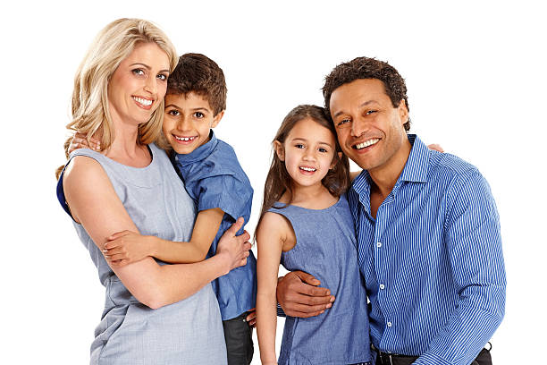 istock Beautiful young family standing together on white 177226415