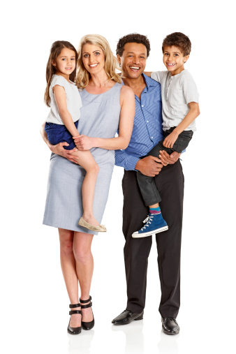 Portrait of happy parents carrying their children over white background