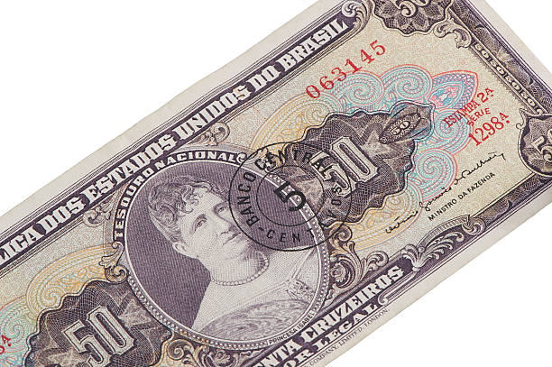 Old brazilian money isolated on white, studio shot.
