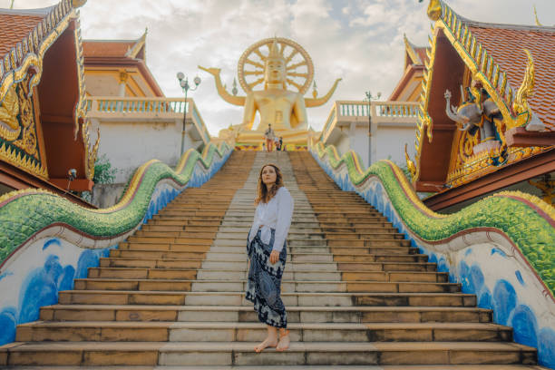 istock Cheerful woman exploring in Big Buddha Temple in Koh Samui 1772274388