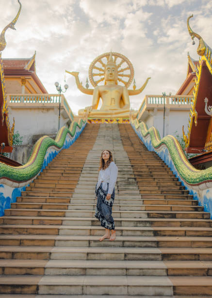 istock Cheerful woman exploring in Big Buddha Temple in Koh Samui 1772275569