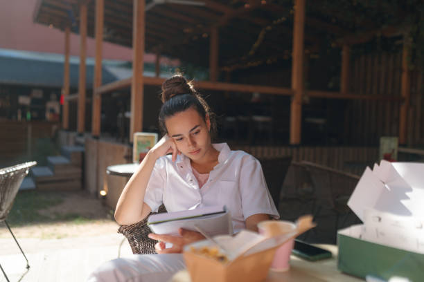 istock Medical student studying in a hospital cafeteria 1772276163