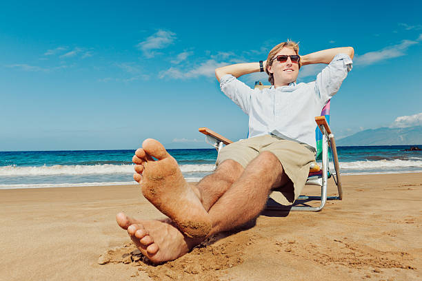 istock Young Attractive Man Relaxing at the Beach 177227698
