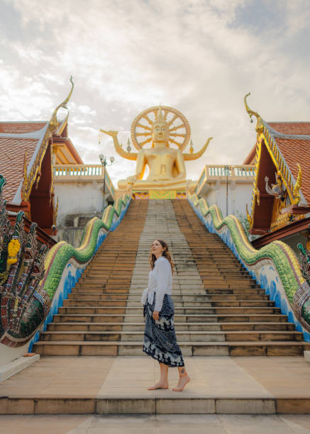 istock Cheerful woman exploring in Big Buddha Temple in Koh Samui 1772278069