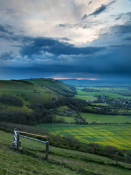 istock Stormy sky over bright countryside landscape 177227917