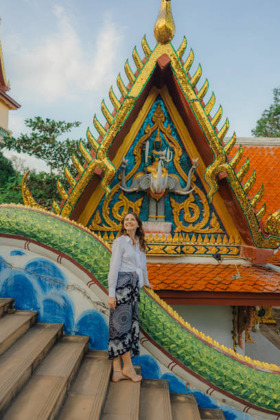 istock Cheerful woman exploring in Big Buddha Temple in Koh Samui 1772279982