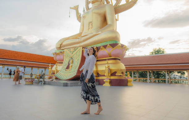 istock Cheerful woman exploring in Big Buddha Temple in Koh Samui 1772282079