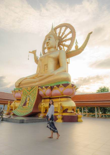 istock Cheerful woman exploring in Big Buddha Temple in Koh Samui 1772282088