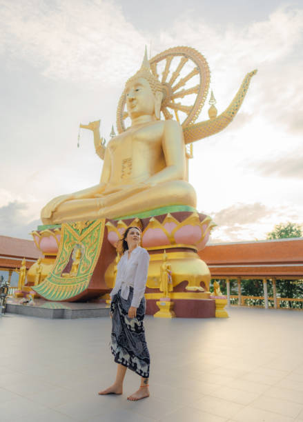 istock Cheerful woman exploring in Big Buddha Temple in Koh Samui 1772282101