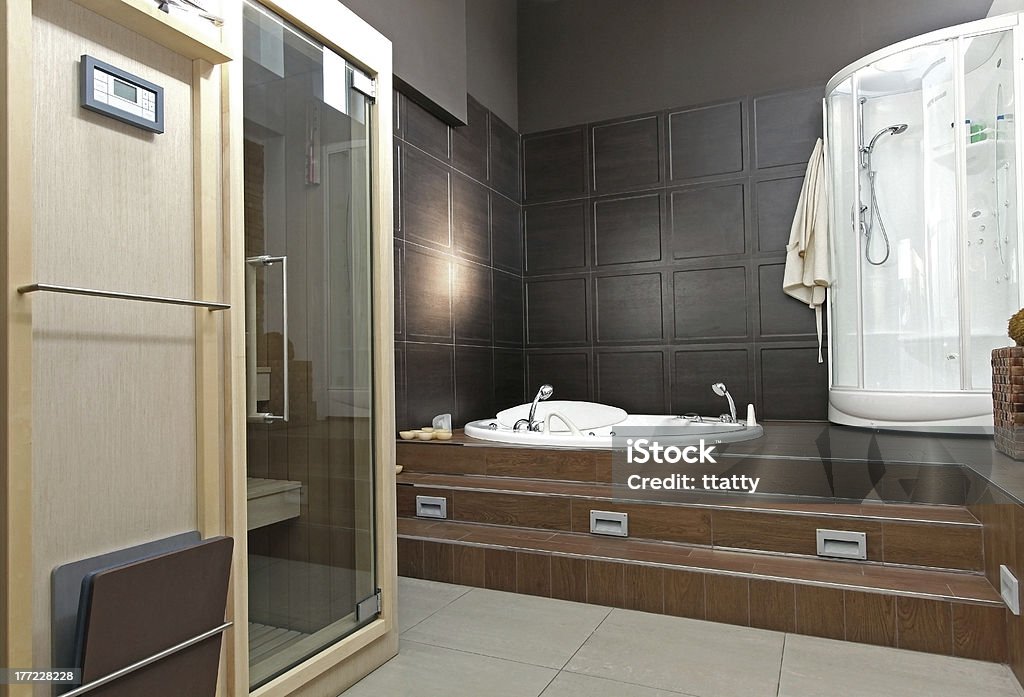 Spa bathroom Modern bathroom interior with sauna and hydromassage bathtub Bathtub Stock Photo