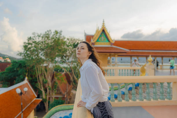 istock Cheerful woman exploring in Big Buddha Temple in Koh Samui 1772282618