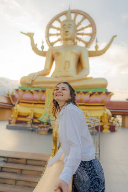 istock Cheerful woman exploring in Big Buddha Temple in Koh Samui 1772282621