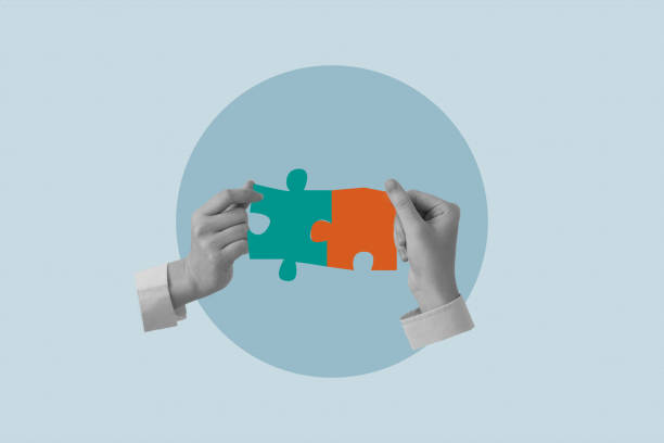 istock Contemporary art collage. two hands connecting puzzles symbolizing teamwok and collaboration 1772282627
