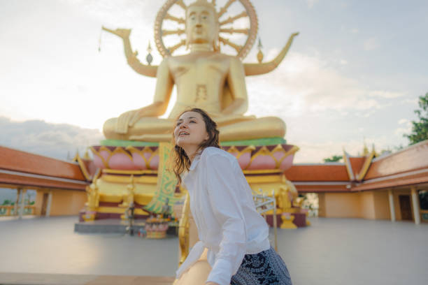 istock Cheerful woman exploring in Big Buddha Temple in Koh Samui 1772283168