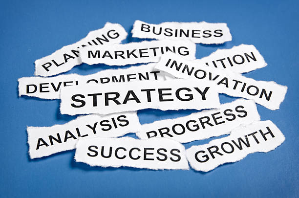 istock Torn newspaper headlines depicting business strategy 177229121
