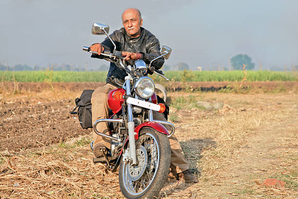 istock Rural Landcape with senior on a motorcycle 177229292