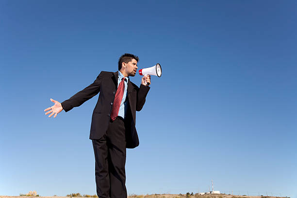 istock Businessman speaking with a megaphone 177229515
