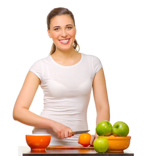 istock Young smiling woman with fruits 177229543