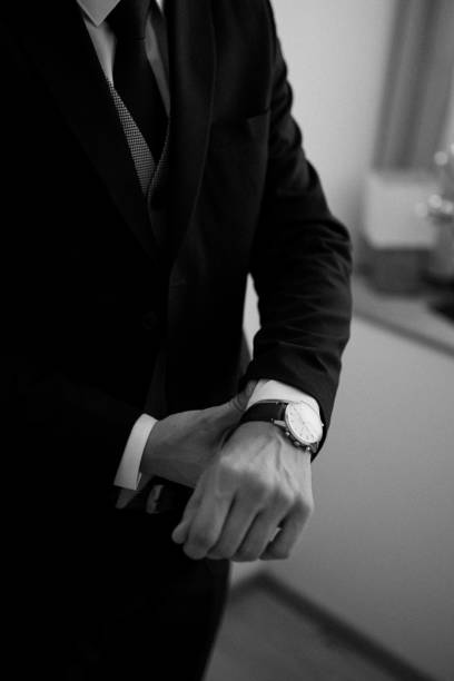 istock A young businessman is getting dressed for a meeting. 1772311154