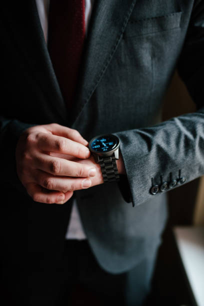istock A young businessman is getting dressed for a meeting. 1772311175