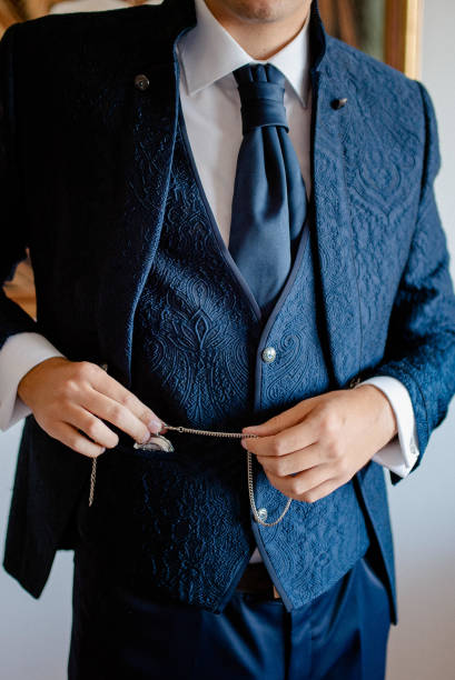 istock A young businessman is getting dressed for a meeting. 1772312238