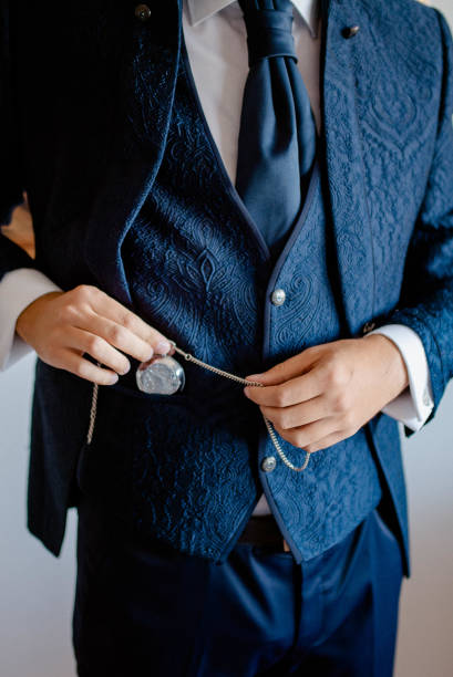 istock A young businessman is getting dressed
 for a meeting. 1772312239