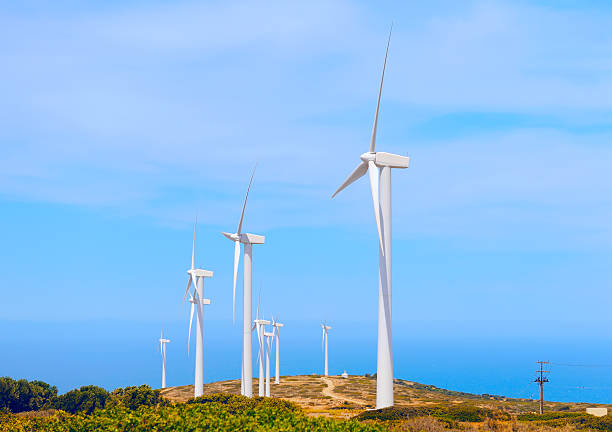 Wind turbines generating electricity stock photo