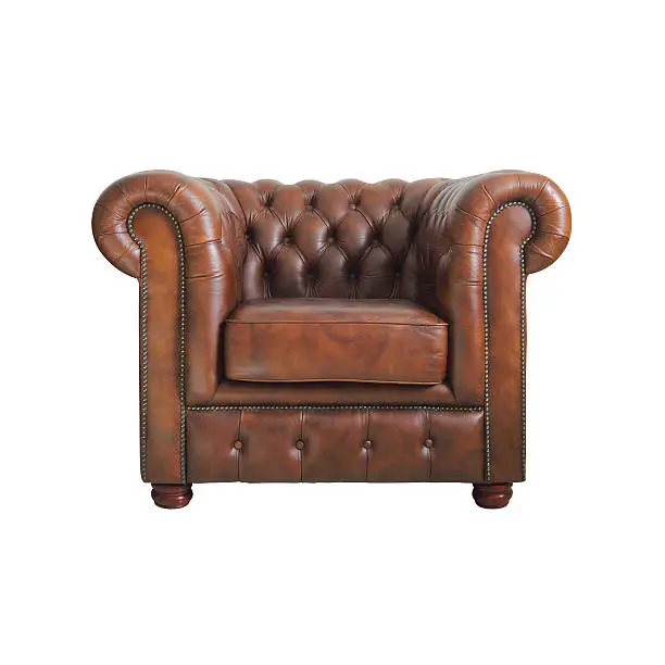 Photo of Classic Brown leather armchair.