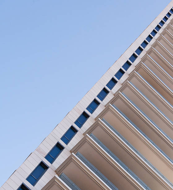 istock diagonal view of a modern apartment building 177233152