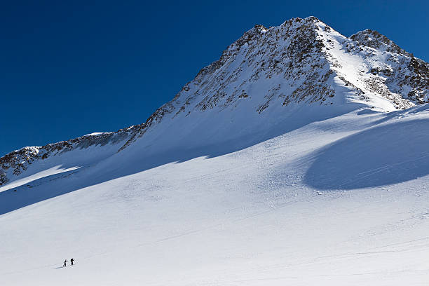 istock ski-alpinists on a glacier in the Alps 177233626