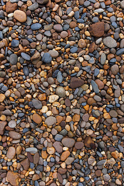 istock various pebble stones and Peach rock for Textured Background 177233795